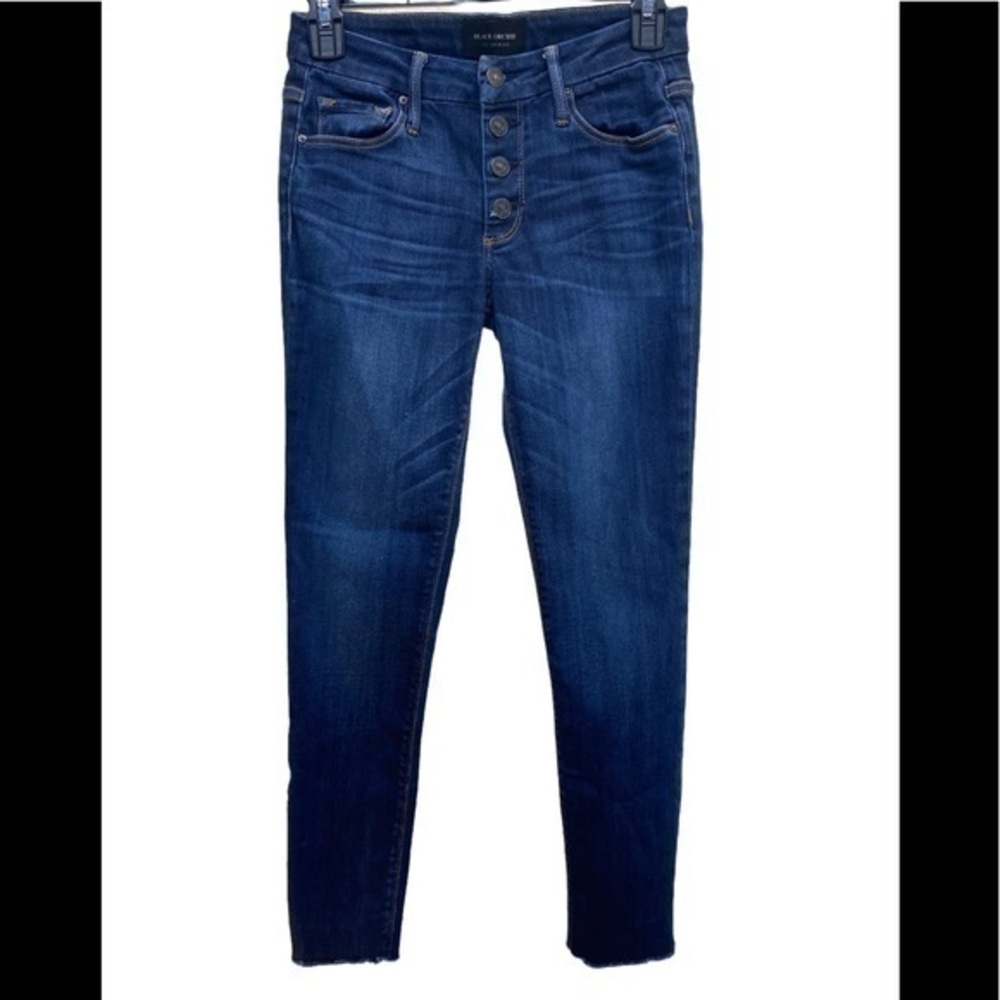 Black Orchid Jeans skinny in a dark wash with button fly closure.